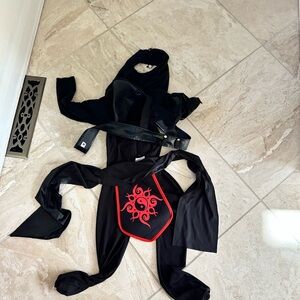 Black kids medium Ninja Costume with Red Trim and Emblem